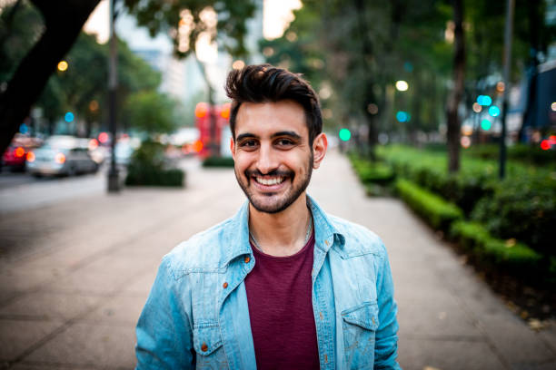 Portrait of a handsome Latin man looking at the camera